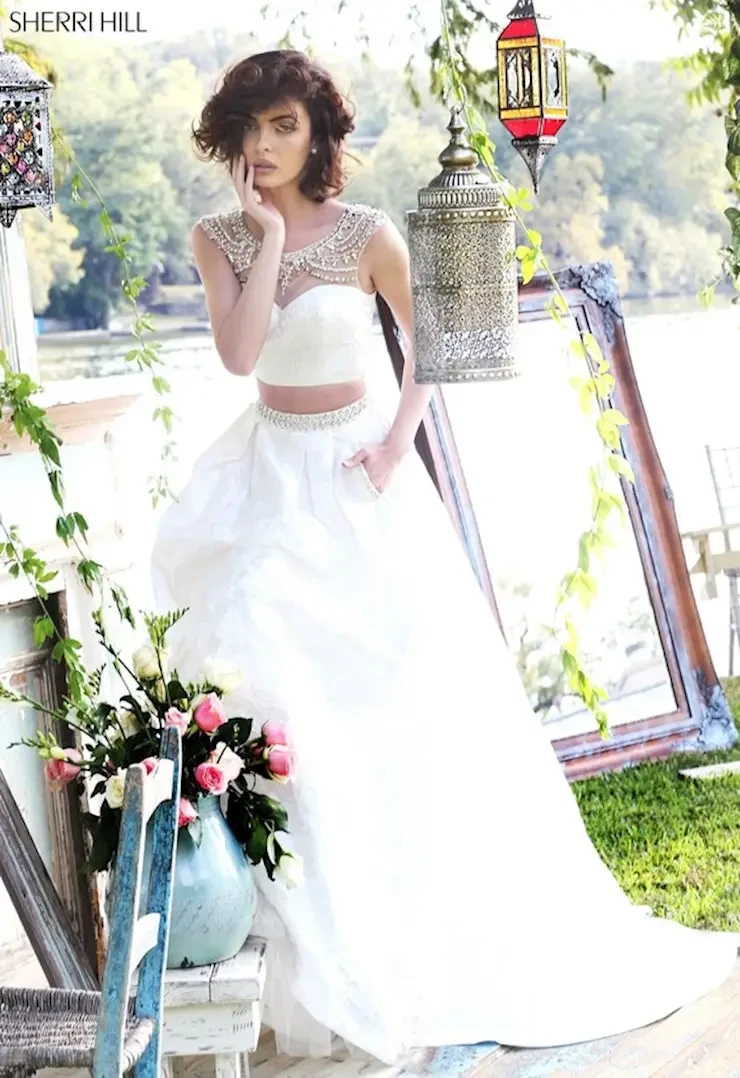 Model wearing a white wedding dress