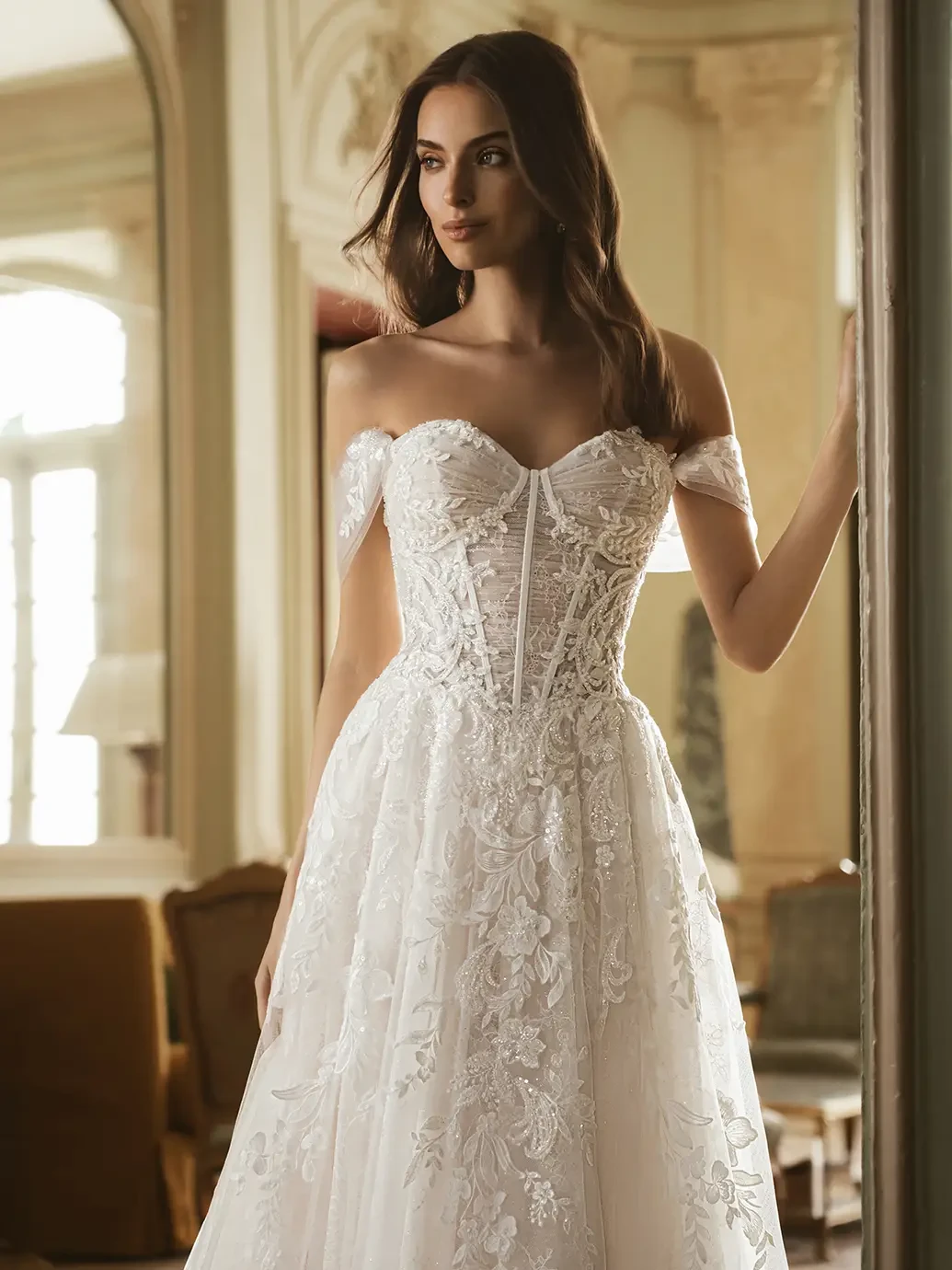 Model wearing a white wedding dress