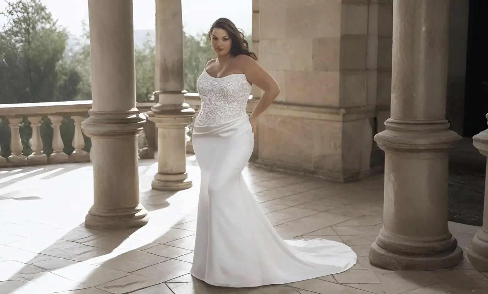 Model wearing a white wedding dress