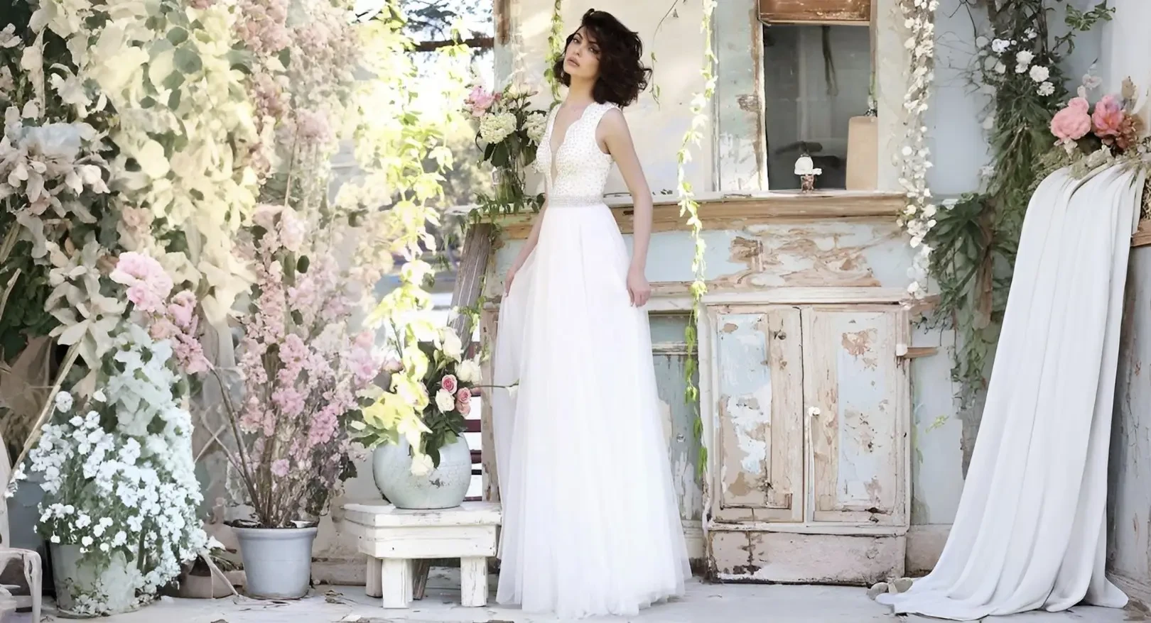 Model wearing a white wedding dress