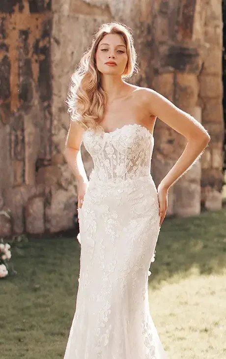 Model wearing a white wedding dress