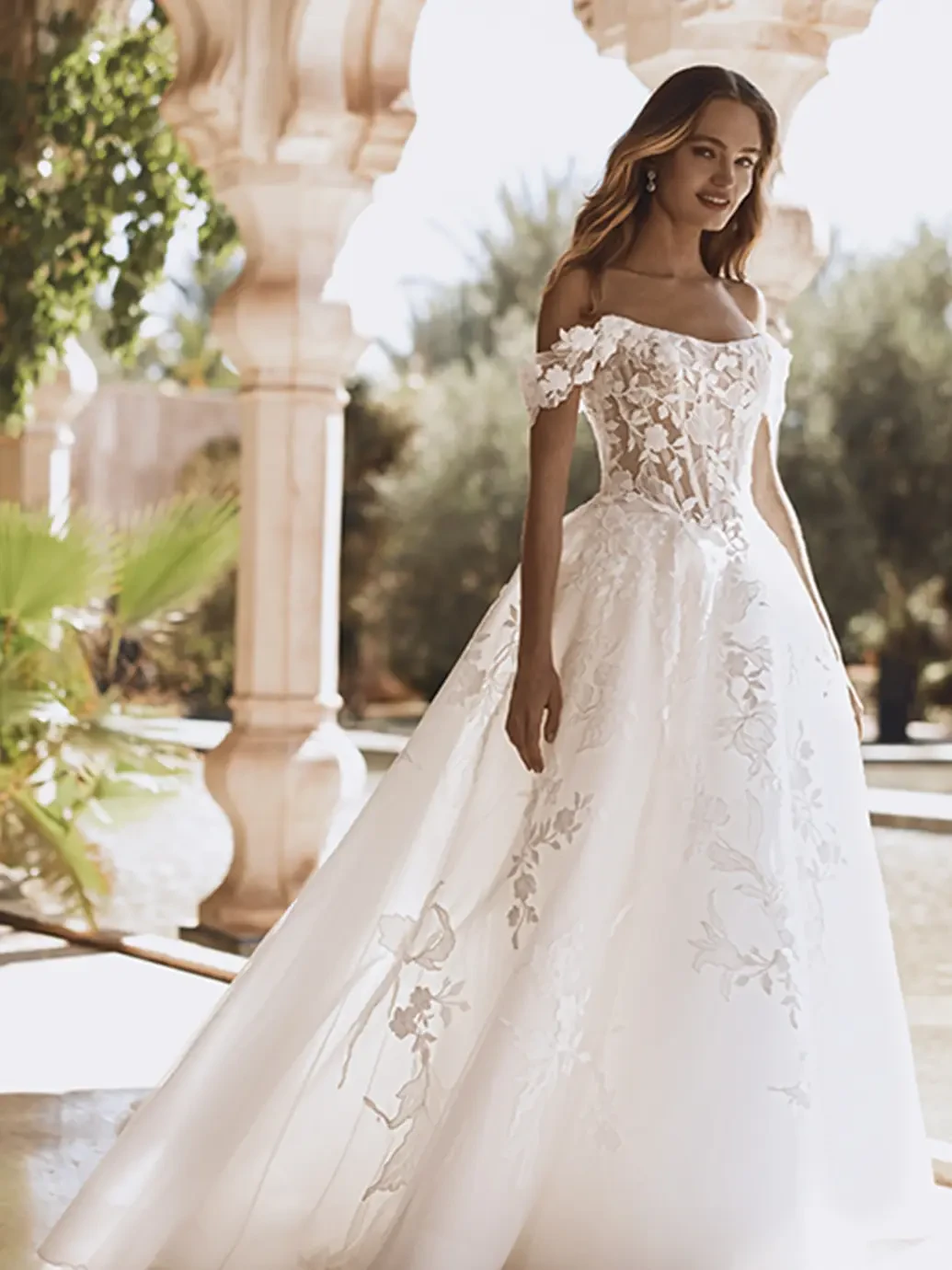 Model wearing a white wedding dress