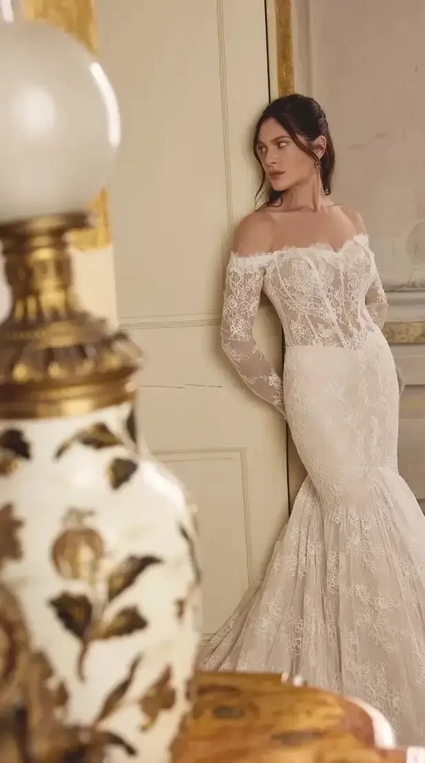 Model wearing a white wedding dress