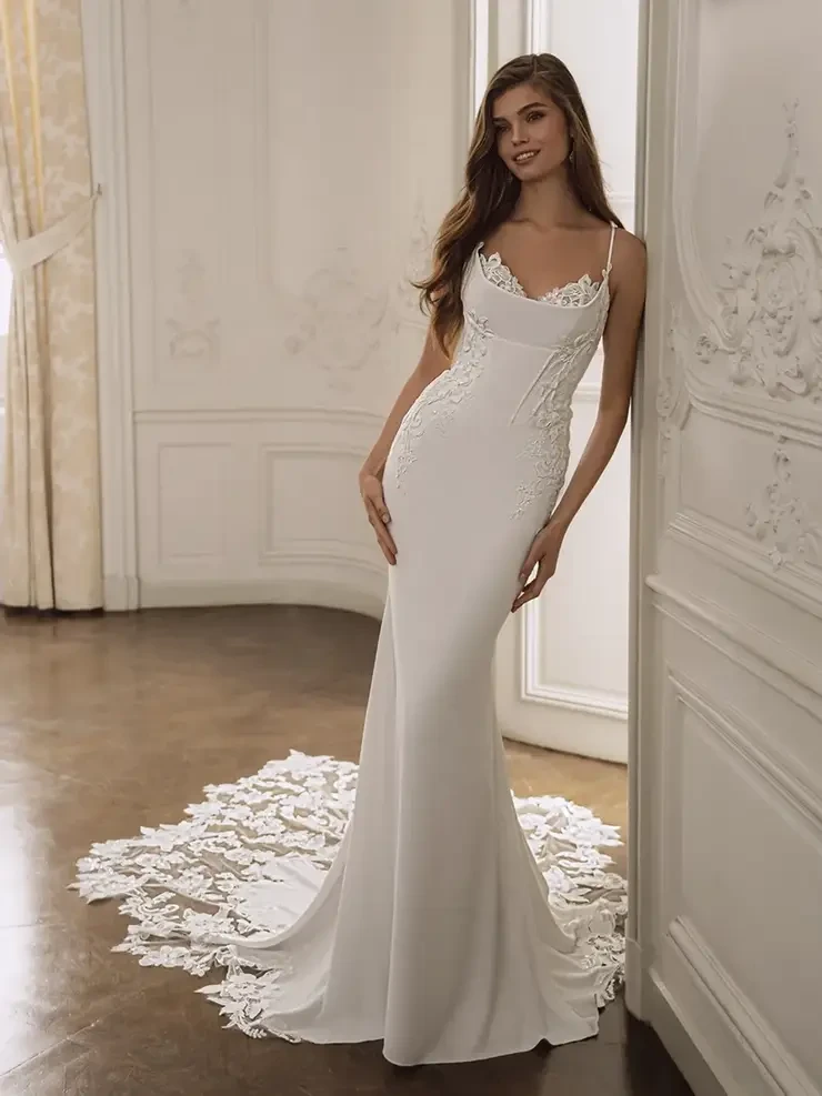 Model wearing a white wedding dress