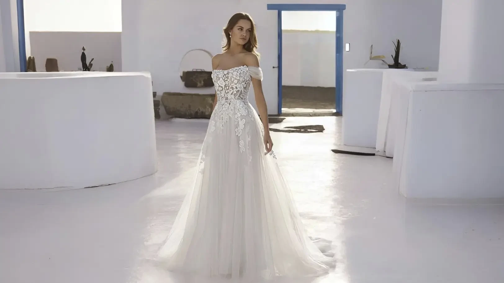 Model wearing a white wedding dress