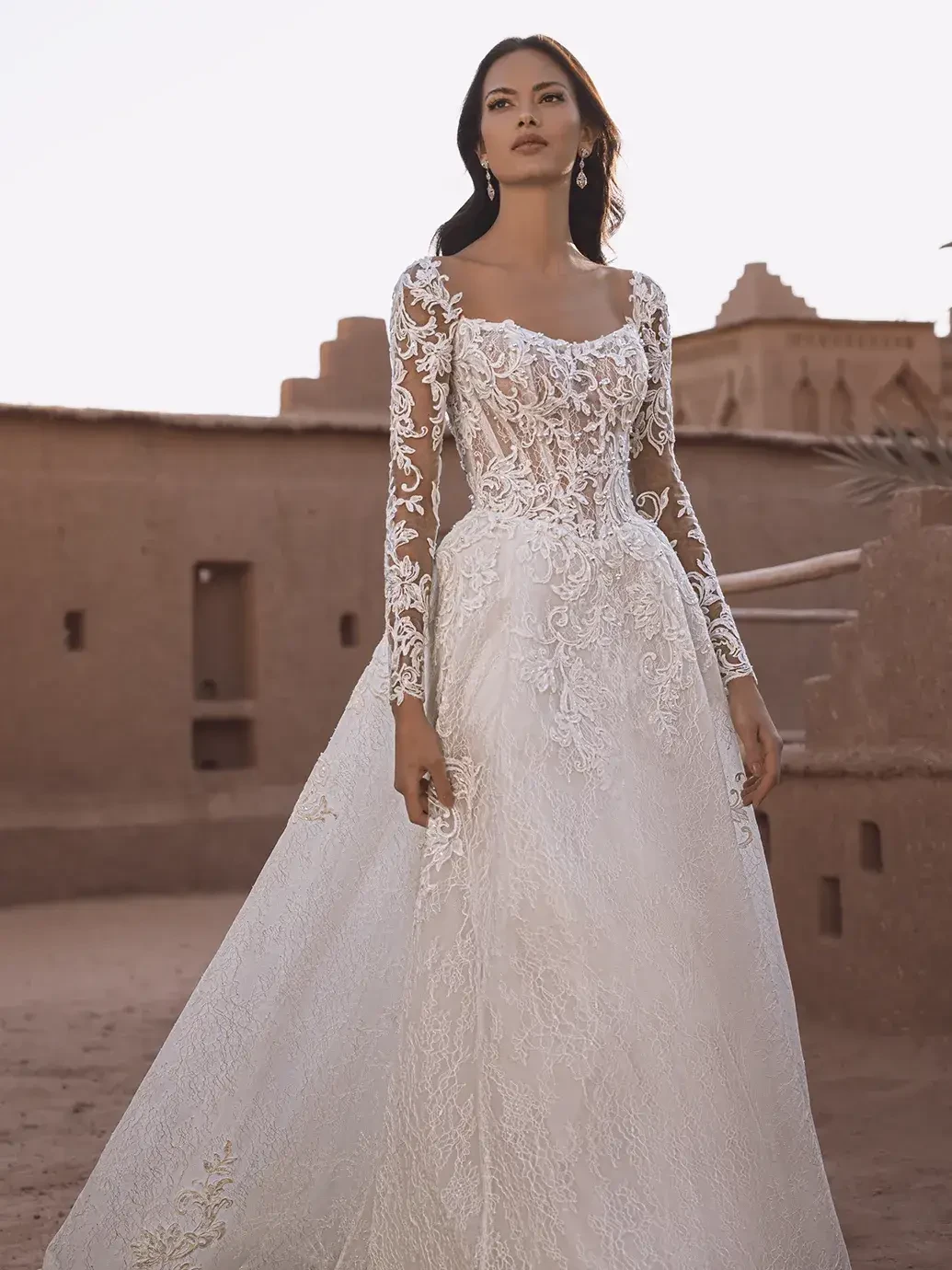 Model wearing a white wedding dress