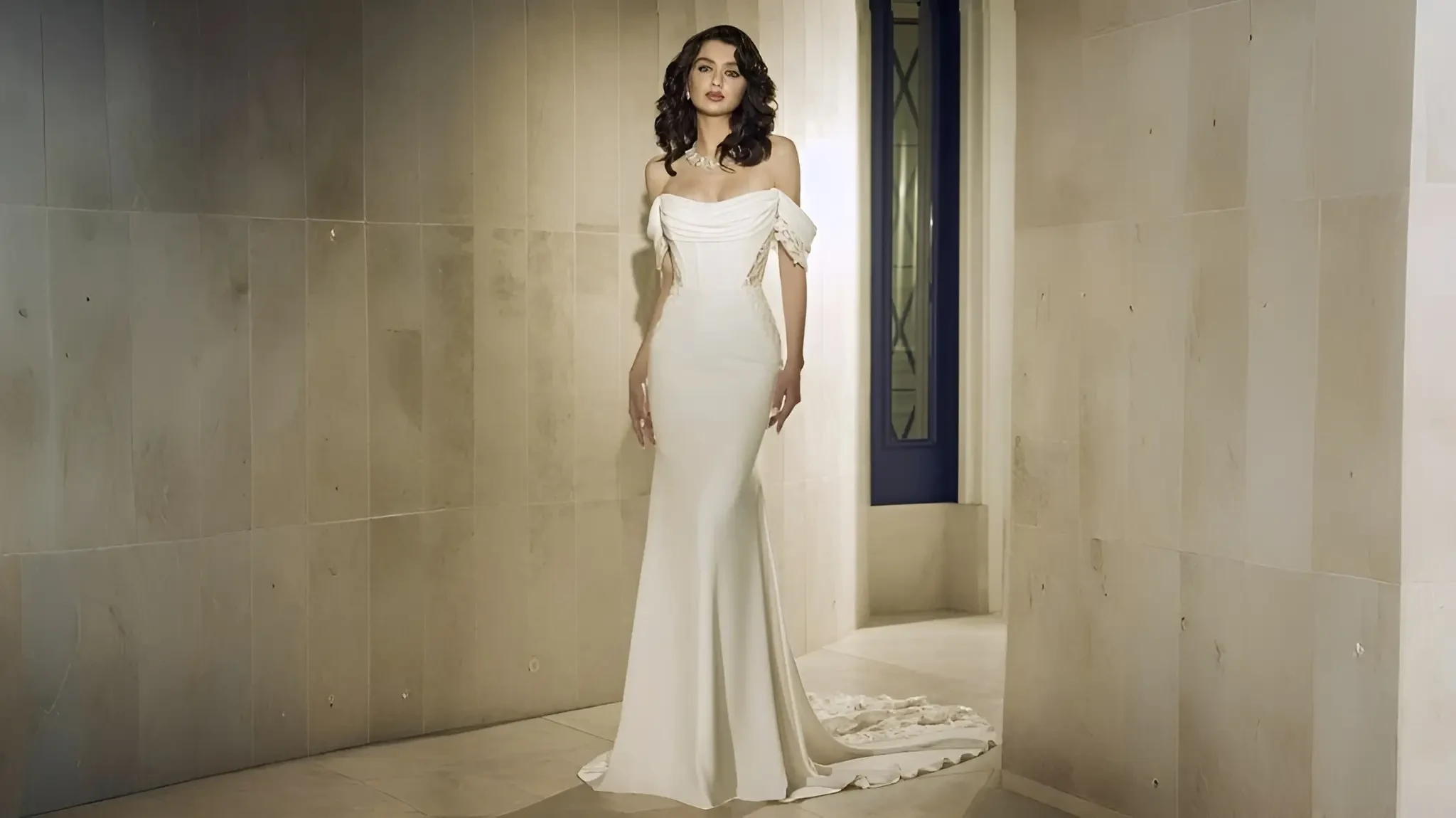 Model wearing a white wedding gown