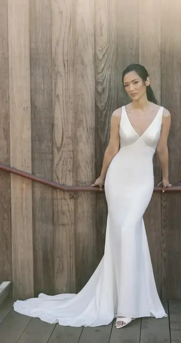 Model wearing a white wedding dress