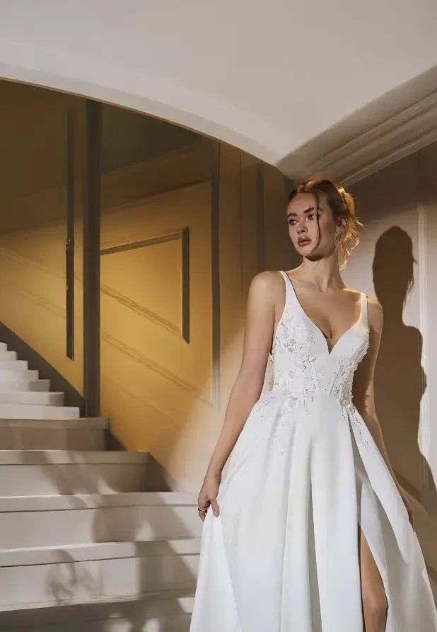 Model wearing a white wedding gown