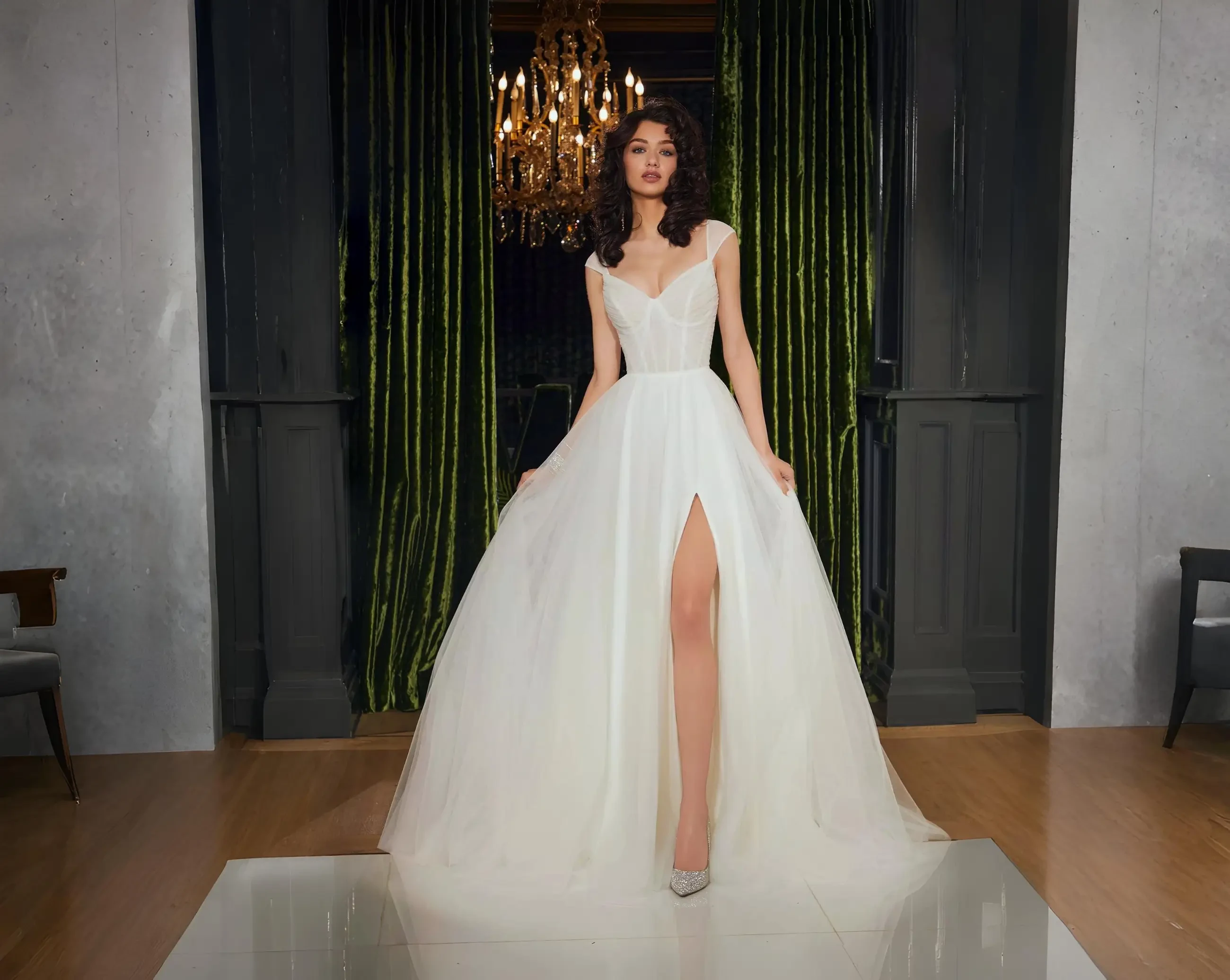 Model wearing an white gown dress