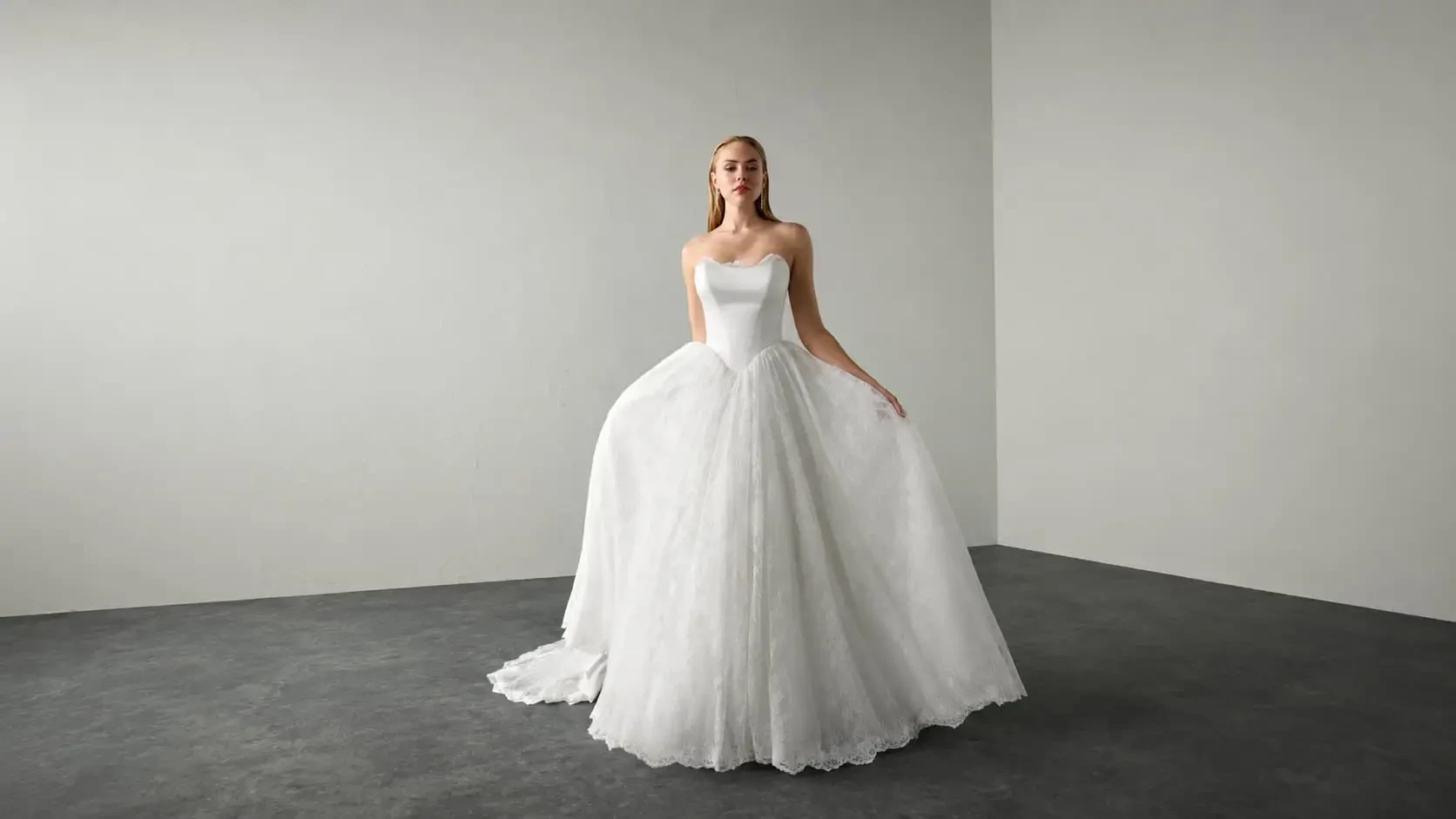 Model wearing a white wedding dress