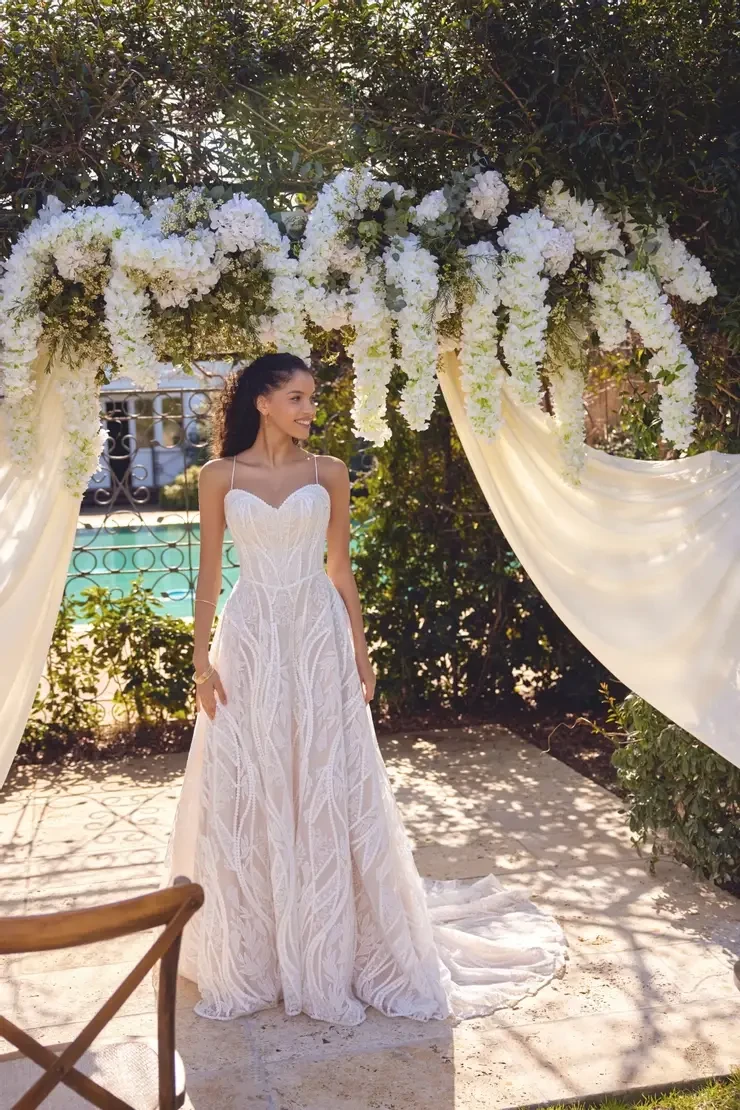 Model wearing a white wedding dress