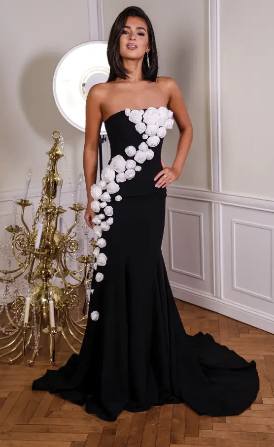 Model wearing black prom dress