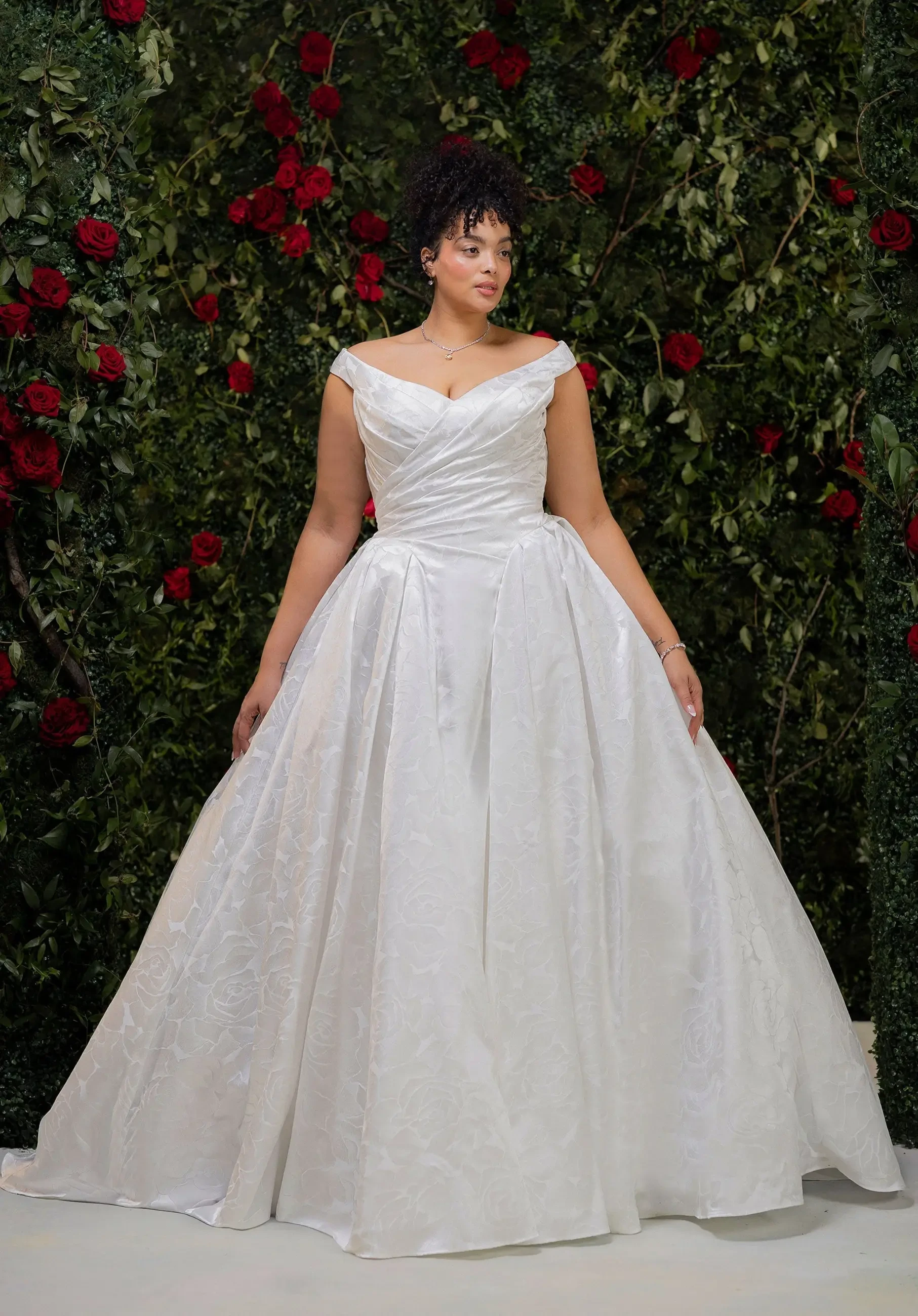Model wearing a white wedding dress