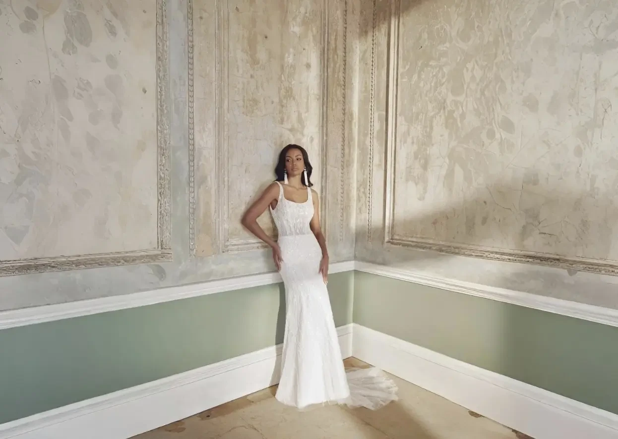 Model wearing a white wedding dress